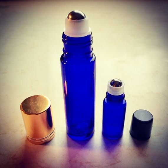 cobalt blue perfume oil roll on bottles